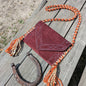 Suede Envelope Crossbody Bag in Burgundy with Braided Orange Strap